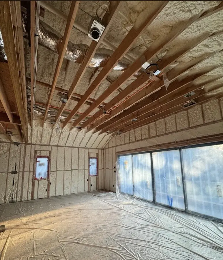 Interior walls and ceiling insulated with spray foam during new construction in Port Orange